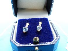 Heart-shaped aquamarine studs marked .