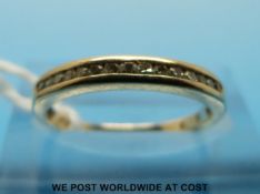 A 9ct gold ring set with diamonds (size J)