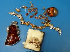 A quantity of silver and amber jewellery to include bracelet,