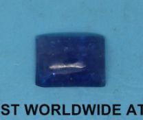 A tanzanite in a rectangular cabochon cut measuring 10.