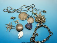 Two mounted coins, a marcasite brooch, hallmarked silver, silver pill box, stick pin,