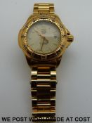 Tag Heuer professional ladies wristwatch with luminous markers and date aperture on gold plated and