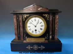 A 19thC French slate mantel timepiece with marble inlay and movement by Brevete,