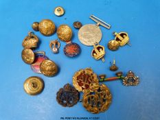 A collection of badges and buttons to include military & RAF