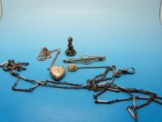 A 9ct gold heart shaped locket, 9ct gold brooch, 15ct gold stick pin,