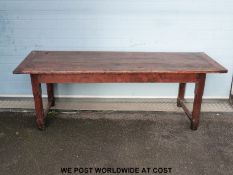 A possibly continental antique elm farmhouse table with three plank top,