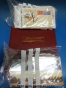 Approximately 45 presentation packs, loose and in an album,