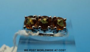 A 9ct white gold three citrine ring (size N)