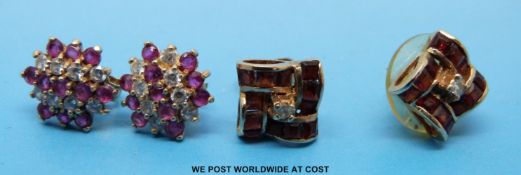 A pair of 9ct gold earrings set with rubies and cubic zirconia and a pair of 9ct gold earrings set