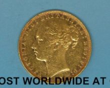 An 1886 young head gold full sovereign type 2 reverse,