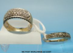 Two 9ct gold rings one set with diamonds in a band the other with diamonds in five bands