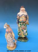 A Japanese figure and a bisque figure