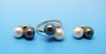 A 9ct gold ring set with two pearls together with a matching pair of earrings