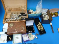 A hallmarked silver bangle, three white metal necklaces, silver cufflinks, two wooden boxes,