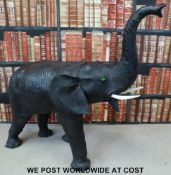 A possibly Liberty leather elephant footstool (Height to tip of trunk 106cm,
