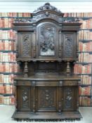 A carved walnut 19thC continental cabinet,