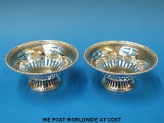 A pair of oval hallmarked silver bon bon dishes of pierced design, Sheffield 1900,
