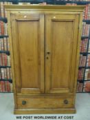 A pine housekeeper's cupboard with drawer below (H168, W106,