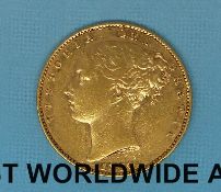An 1870 young head gold full sovereign, shield back, die no 121,