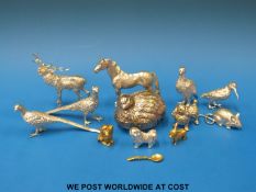 A collection of silver plated animals to include stag, horse, mouse, dogs,