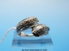 A 9ct white gold ring set with diamonds (size L)