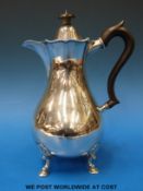A George V Scottish hallmarked hot water jug, Edinburgh 1916, maker Brook & Son (height 22cm,