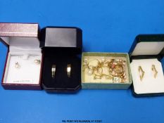 A quantity of 9ct gold earrings