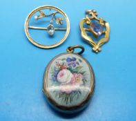 A yellow metal brooch marked 15ct gold set with aquamarine and seed pearls,