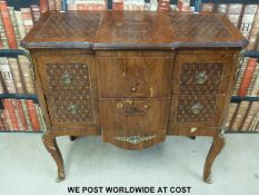 A continental chest of two drawers with gilt mounts,