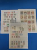 A selection of Belgium and Dutch stamps on stock cards