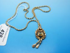 An 18ct gold necklace of knot design,