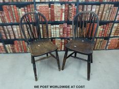 A pair of hoop back Windsor kitchen chairs