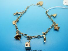 A 9ct gold charm bracelet (18.