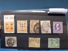 A stockcard of stamps including Japanese occupation of North China mint 4c on 8c SG117. 1861 USA 24c