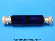 A blue glass double ended scent bottle with white metal ends,