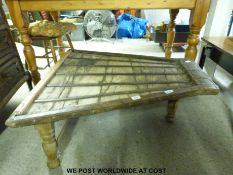 An unusual arc shaped coffee table with iron bands (H38 x W90 x D90cm)