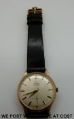 Omega 9ct gold gentleman's wristwatch with subsidiary seconds dial, gold skeleton hands,