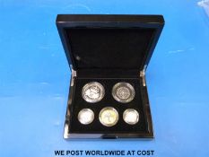 A 2010 cased set of five piedfort silver proof coins commemorating important events in British