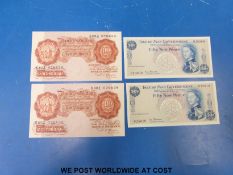 Two 'Beale' ten shilling 'letter number letter' consecutive banknotes together with two Isle of Man