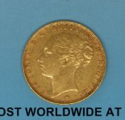An 1887 young head gold full sovereign type 2 reverse,