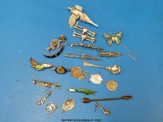 Two white metal brooches marked 925 each in the form of a fox's head and riding crop,