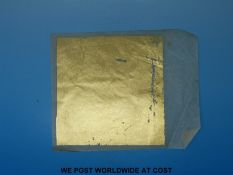 A book containing gold leaf by 'Geo.