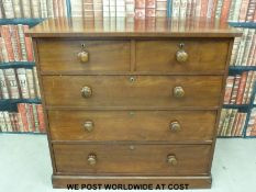 A 19thC mahogany or possibly ash chest of two over three drawers with turned handles (H100 x W107 x