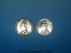 An 1887 jubilee crown and and 1887 double florin.