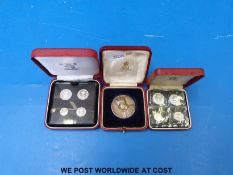 Cased coins comprising Maundy coins and a Prince of Wales investiture example