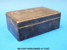 A hallmarked silver cigarette box (length 14cm)