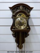 A reproduction Dutch clock with two-train movement,