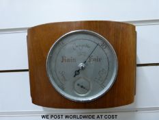 A c1950 aneroid wooden cased barometer by Smiths