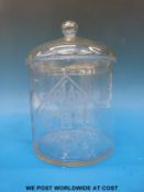 A vintage glass display barrel for 'Smiths Potato Crisps'