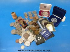 A quantity of coins to include modern crowns and approximately 290g of pre 1947 coins